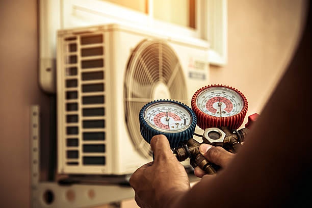 Professional Hvac technician working in Hales Corners, WI